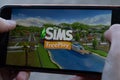 New York, USA - 1 May 2020: Sims FreePlay app logo close-up on phone screen, Illustrative Editorial