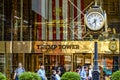 New York, USA May 31, 2023: Trump\'s famous gold clock, in front of the gold facade and entrance to Trump Tower.