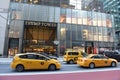 New York, USA - May 25, 2018: Yellow taxi passing in front the