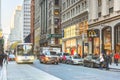 Urban scene in New York with traffic jam and pedestrians