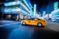 NYC Yellow Cab passing Fast at Night in Timesquare Manhattan, Ne