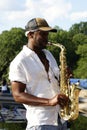 New York, USA - October 5, 2018: Street saxophonist practicing