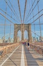 Tourists sightseeing the Brooklyn Bridge in New York Royalty Free Stock Photo