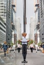 Elderly gray-haired man with a mobile phone in NYC