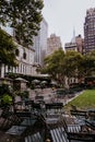 Green lawn and skyscrapers in Bryant Park in Midtown Manhattan Royalty Free Stock Photo