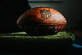 NFL Trademark: Leather Ball and Iconic Logo. Official National Football league ball places i Royalty Free Stock Photo