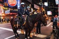 NYPD police officers on horse back in Times Square New York City