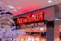 New Yorker - designer Label, neon sign close-up, NewYorker store entrance in shopping mall on New Year\'s and Christmas