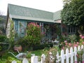 New Zealand: Akaroa historic pink and blue cottage Royalty Free Stock Photo