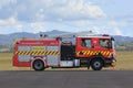 A New Zealand fire and emergency services firetruck at an airport