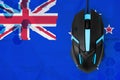 New Zealand flag and computer mouse. Concept of country representing e-sports team