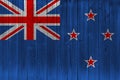 New Zealand flag painted on old wood plank