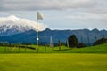 New Zealand Golf Course hole with Mountain in distance Royalty Free Stock Photo