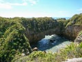 New Zealand pancake rock over seacoast Royalty Free Stock Photo