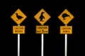 New Zealand road signs on black background. Caution kiwis caution wekas, caution penguins Royalty Free Stock Photo