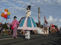 New Zealand: small town Christmas parade clown women