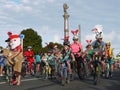 New Zealand: small town Christmas parade cyclist families