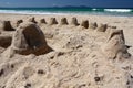 New Zealand: summer beach sand castles h Royalty Free Stock Photo