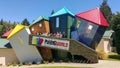 Group of travelers having fun at the Puzzling World, Wanaka, New Zealand Royalty Free Stock Photo