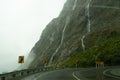 New Zealand waterfalls during a rain storm in the mountains.