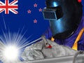 NEW ZEALANDER WELDER WITH BACKGROUND OF HIS FLAG