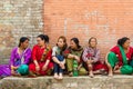 Newar women sit and await Bisket Jatra festivities