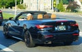 Newark, Delaware, U.S - June 08, 2021 - A blue M44Di BMW convertible on Route 4 near Churchman Road