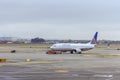 At Newark International Airport EWR passenger airplane United Airlines prepares to depart with on runway Royalty Free Stock Photo