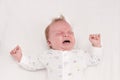 Newborm baby screaming just after born. Infant boy crying
