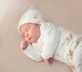 Newborn adorable one week baby boy sleeping