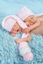 Newborn babies with pink hats Royalty Free Stock Photo