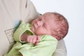Newborn baby in the arms of his dad Royalty Free Stock Photo