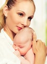 Newborn baby in the arms of mother Royalty Free Stock Photo