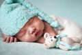 Newborn baby asian boy sleeping at blue background Royalty Free Stock Photo