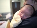 Newborn baby is being held with hands of mother Royalty Free Stock Photo