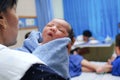 Newborn baby is being held with mother in hospital Royalty Free Stock Photo