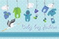 Newborn baby-boy clothes hanging on the rope.Baby fashion