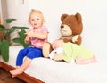 Newborn baby boy with little sister and Teddy bear Royalty Free Stock Photo