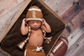 Newborn Baby Boy in Football Costume Royalty Free Stock Photo