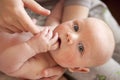 newborn baby boy -in the hands of the mother