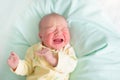 Newborn baby boy in hosptal cot