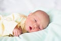 Newborn baby boy in hosptal cot