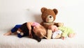 Newborn baby boy with little sister sleeping on Teddy bear Royalty Free Stock Photo