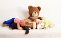 Newborn baby boy with little sister sleeping on Teddy bear Royalty Free Stock Photo