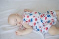 Newborn baby boy lying on bed Royalty Free Stock Photo