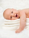 Newborn Baby Boy Relaxing On Stack Of Towels Royalty Free Stock Photo