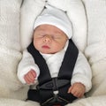 Newborn baby boy sleeping in comfortable car seat Royalty Free Stock Photo