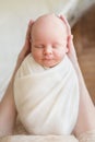 Newborn baby boy sleeping in mom arms Royalty Free Stock Photo