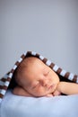 Newborn Baby Boy Sleeping Peacefully Under Striped Blanket Royalty Free Stock Photo