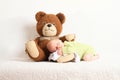 Newborn baby boy sleeping on Teddy bear Royalty Free Stock Photo